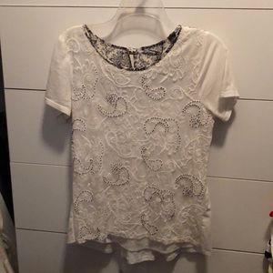 White top with black beads